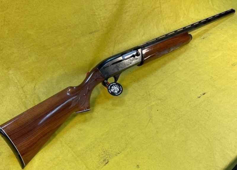 Collector grade Remington 1100 12ga excellent engr