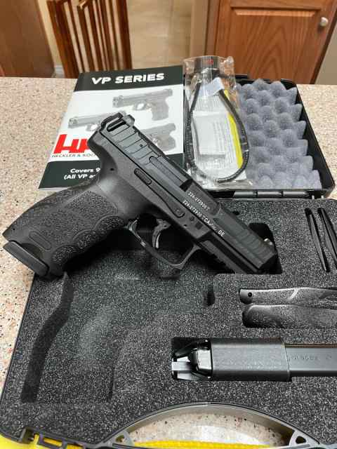 HK VP9, optic plate, 4 mags, holster:  Mint