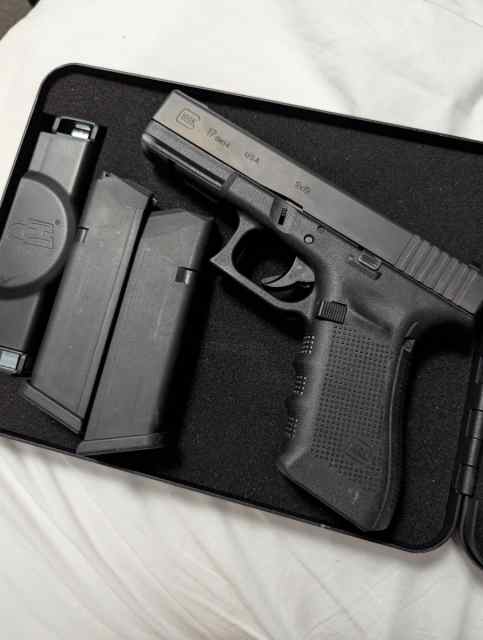 Glock 17 Gen 4 with orange night sights 