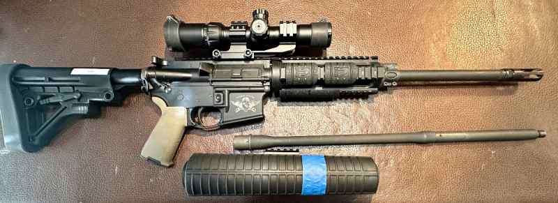 300 blackout with scope and 20” 5.56 barrel 